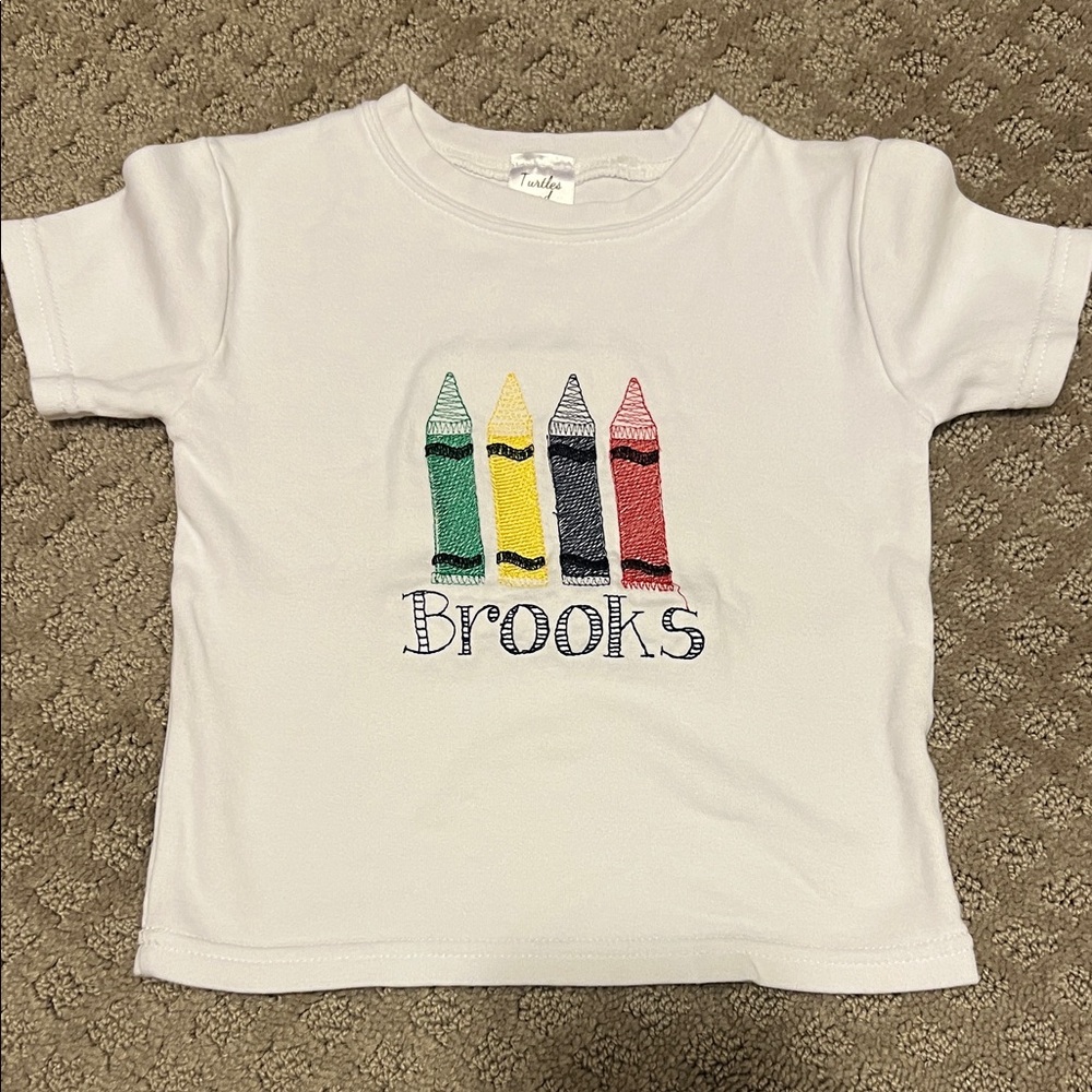 Brooks White Tee with Colorful Crayon Design